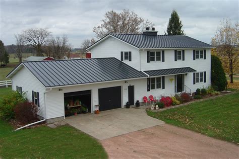 gray metal roof on white house|white standing seam metal roof.